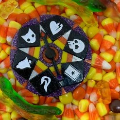 Faire Lipstick & Chrome Wheel Of Fortune Brooch